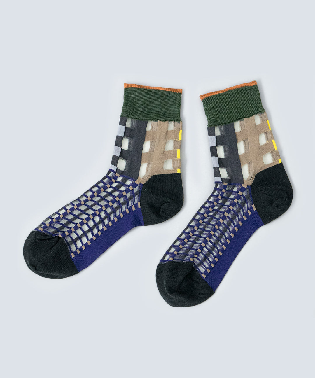 Close-up image of COQ Picnic Window Socks in navy, made in Japan, showcasing the checked pattern and translucent design details.