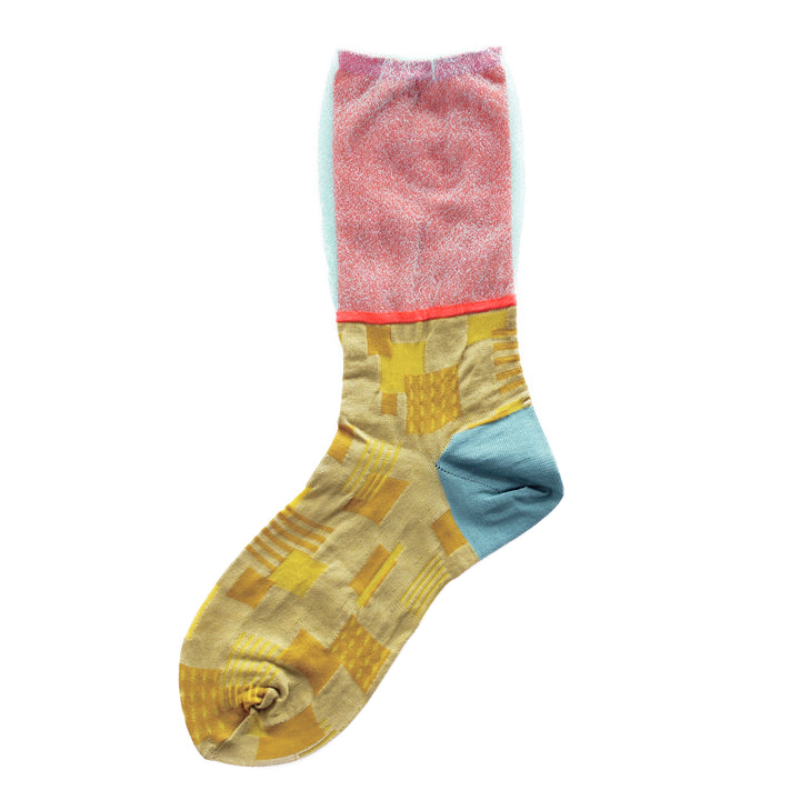 Image of a single COQ Sunlight Block Sock in yellow and red, showcasing its geometric patterns and varying textures and fabrics.