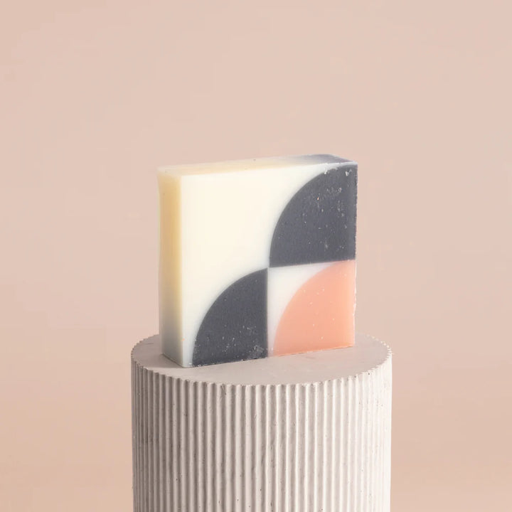 Colourful organic Ciment kimono Fleur de Cerisier soap unwrapped, with a cherry blossom scent.