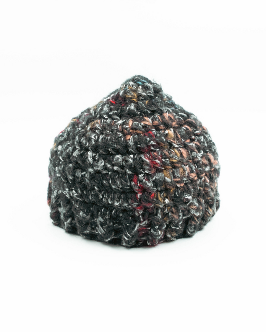 Textured beanie hat on a white background