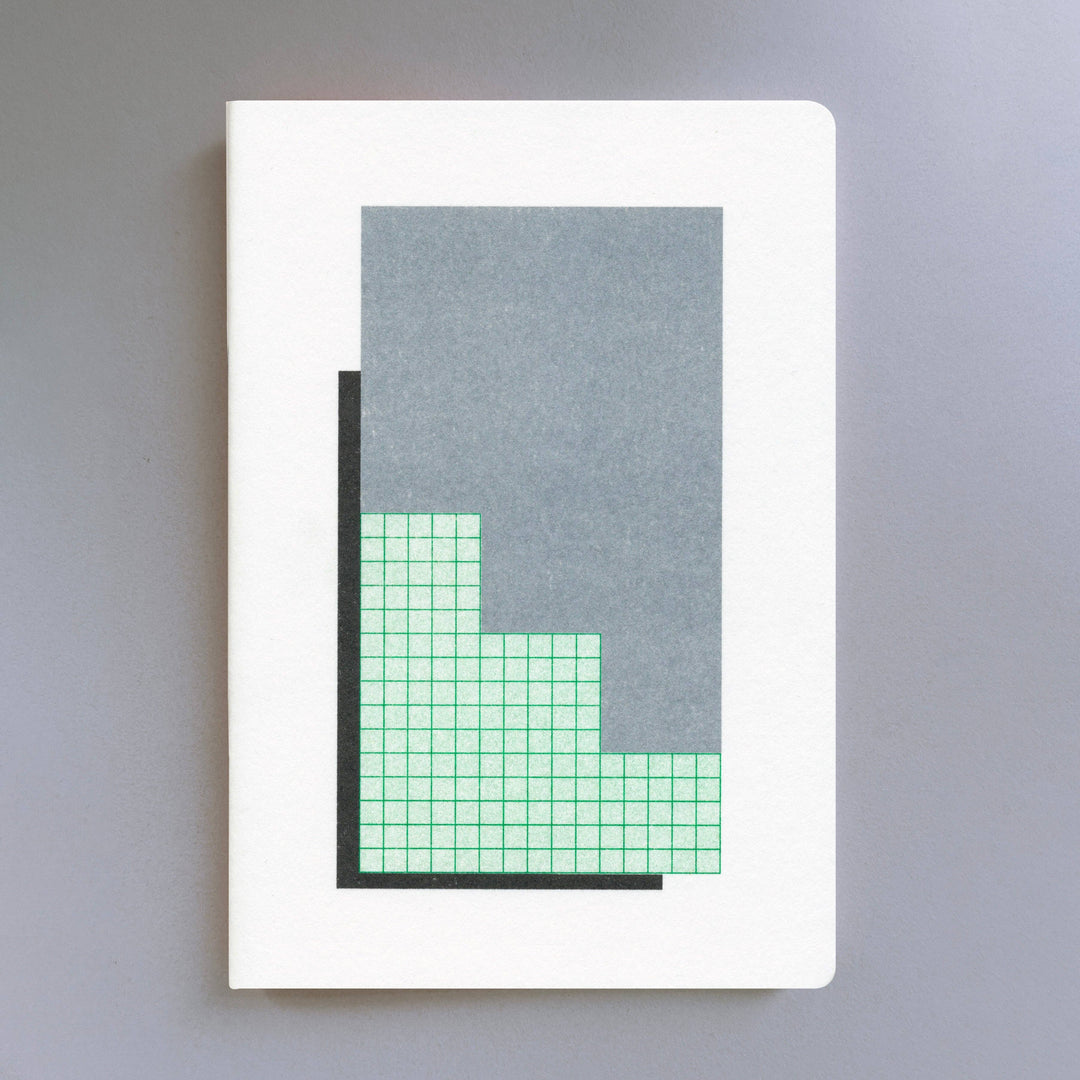 Risograph Notebook with geometric design on a gray background