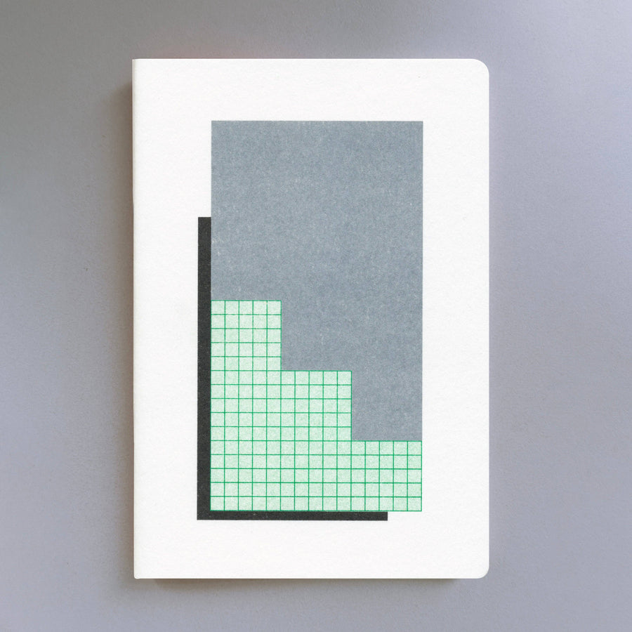 Risograph Notebook with geometric design on a gray background