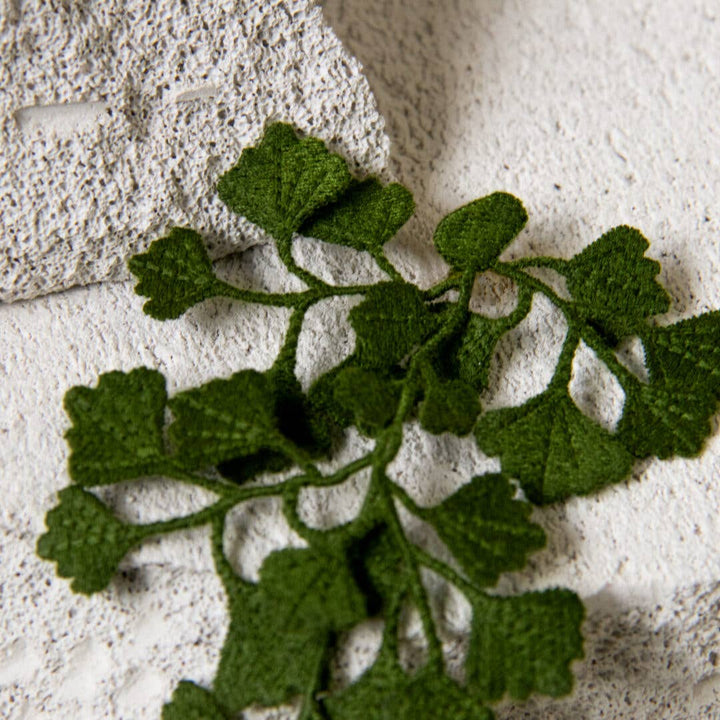 Close-up of the Botanopia Maidenhair fern embroidery brooch, highlighting its details and texture.