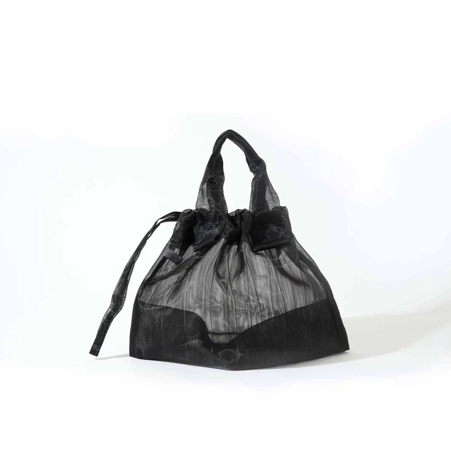 Image showcasing a Japan Mate Mono see-through bag in black, stylishly displayed against a clean white background.