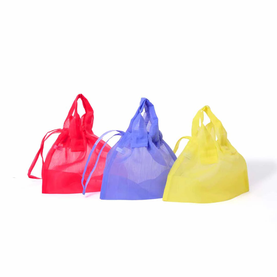 Image featuring four Japan Mate Mono see-through bags in various colours, stylishly placed against a clean white background.
