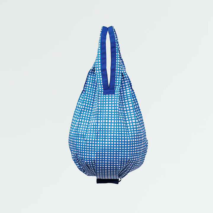 Blue checkered bag on a light gray background