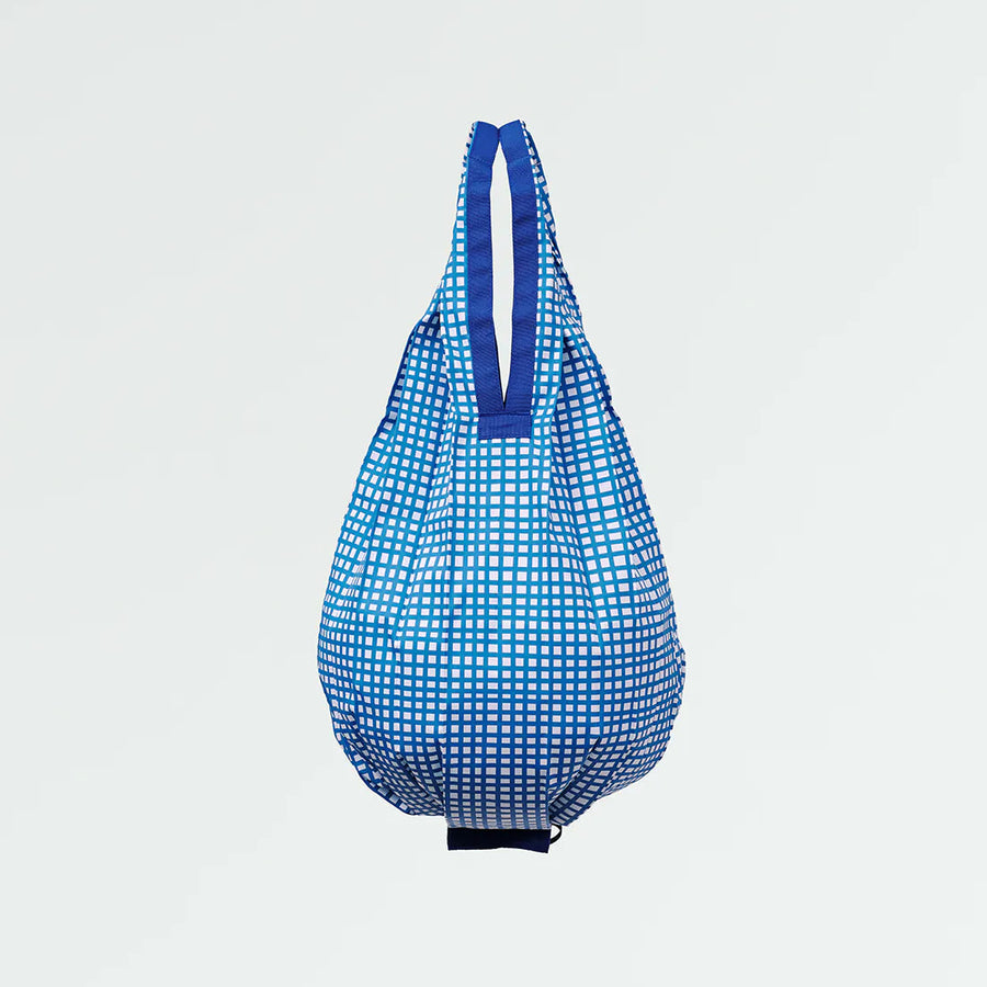 Blue checkered bag on a light gray background