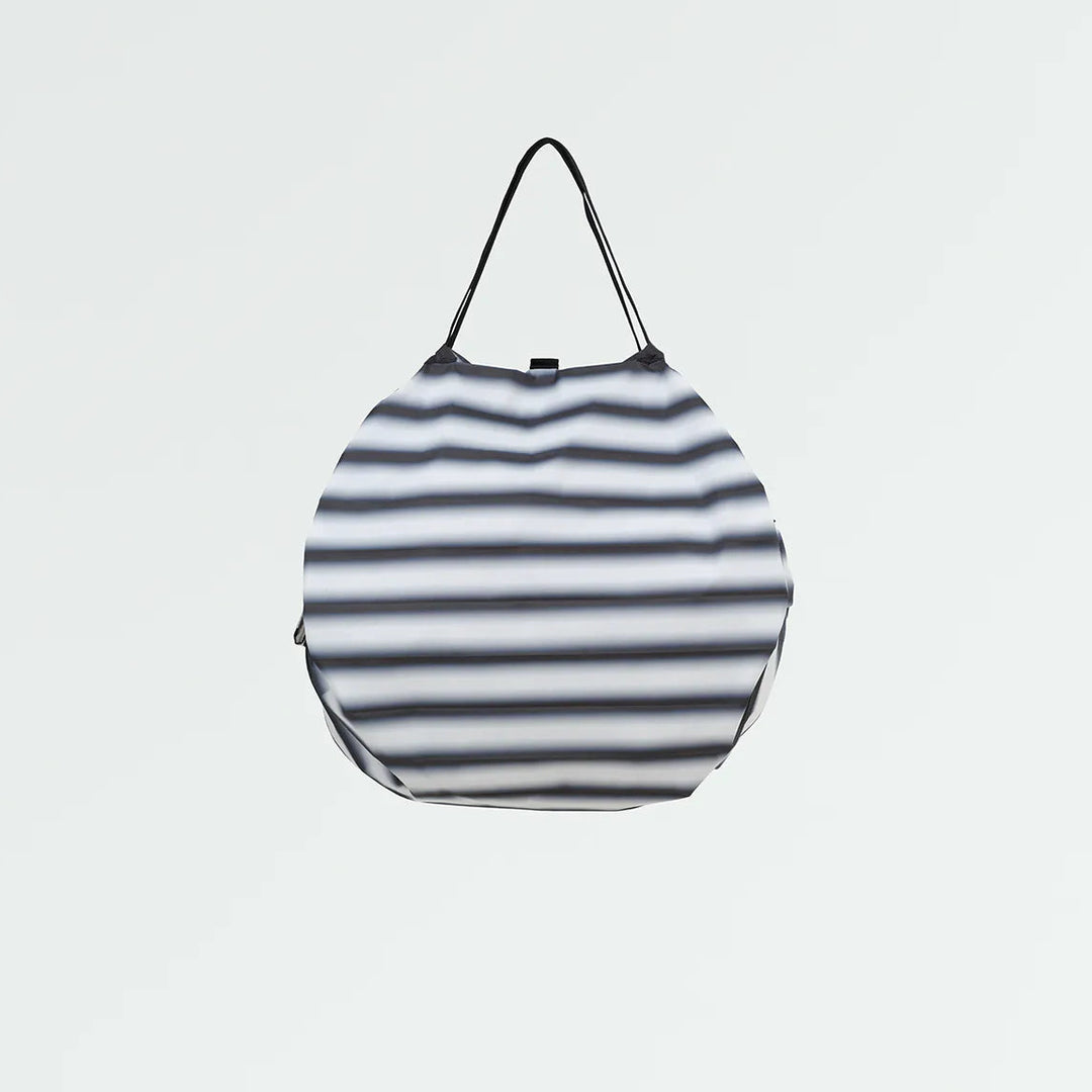 Striped bag on a light gray background