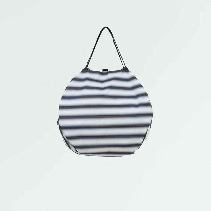Striped bag on a light gray background