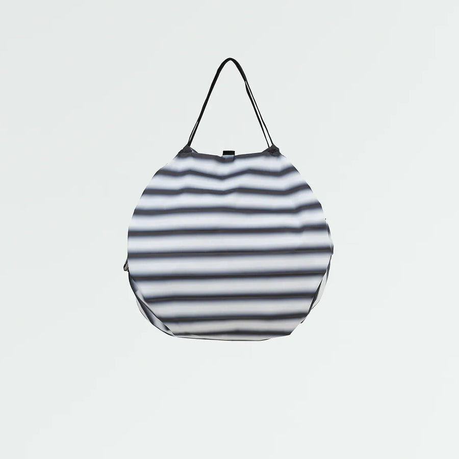 Striped bag on a light gray background