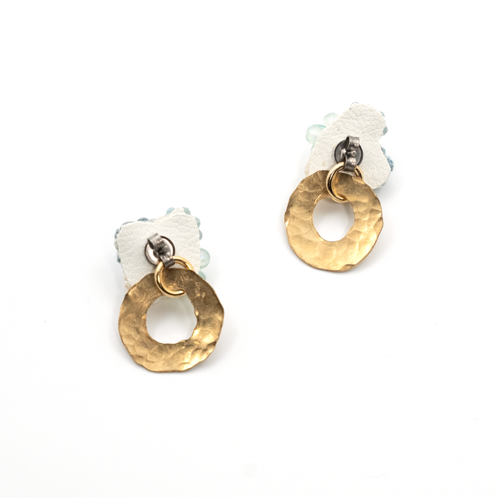Gold hoop earrings on a white background